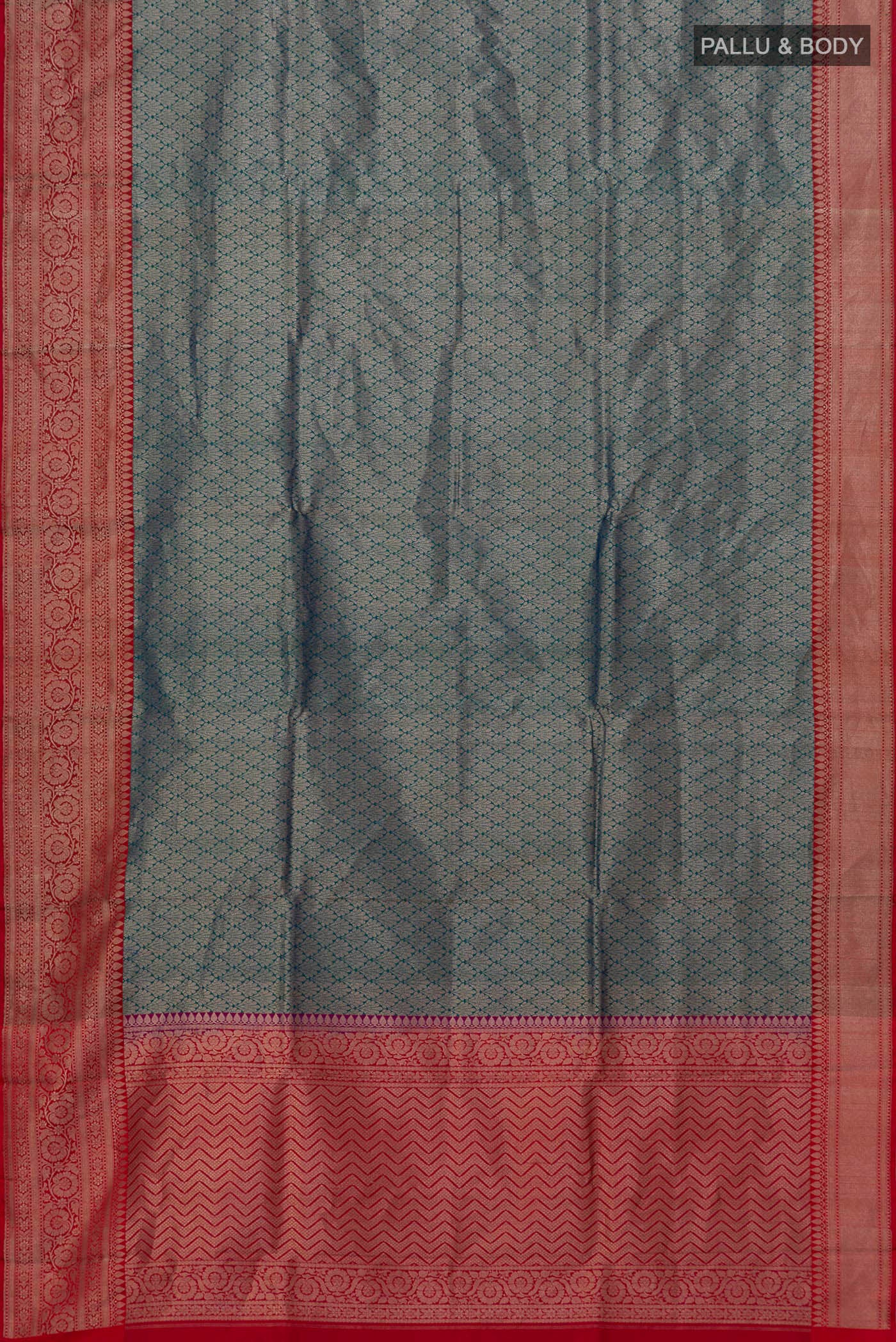 Flat view of Peacock Blue Banarasi Silk Saree with Zari Brocade on the body and Zari Border. 