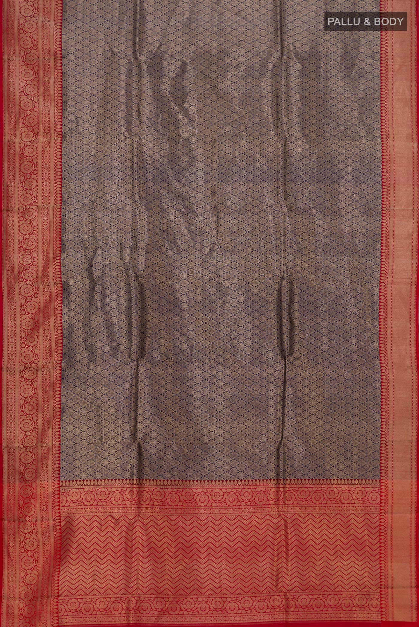 Flat view of Blue Banarasi Katan Silk Saree with Zari Brocade on the body and Fancy Border. 