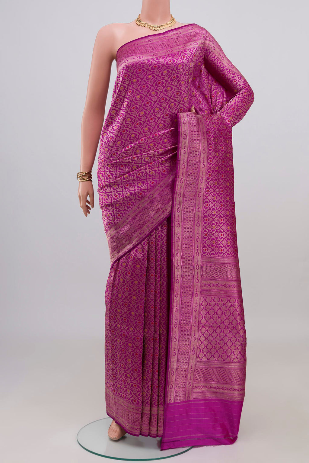 Purple Banarasi Katan Silk Saree with Zari Brocade on the body and Zari Border.  displayed on a mannequin