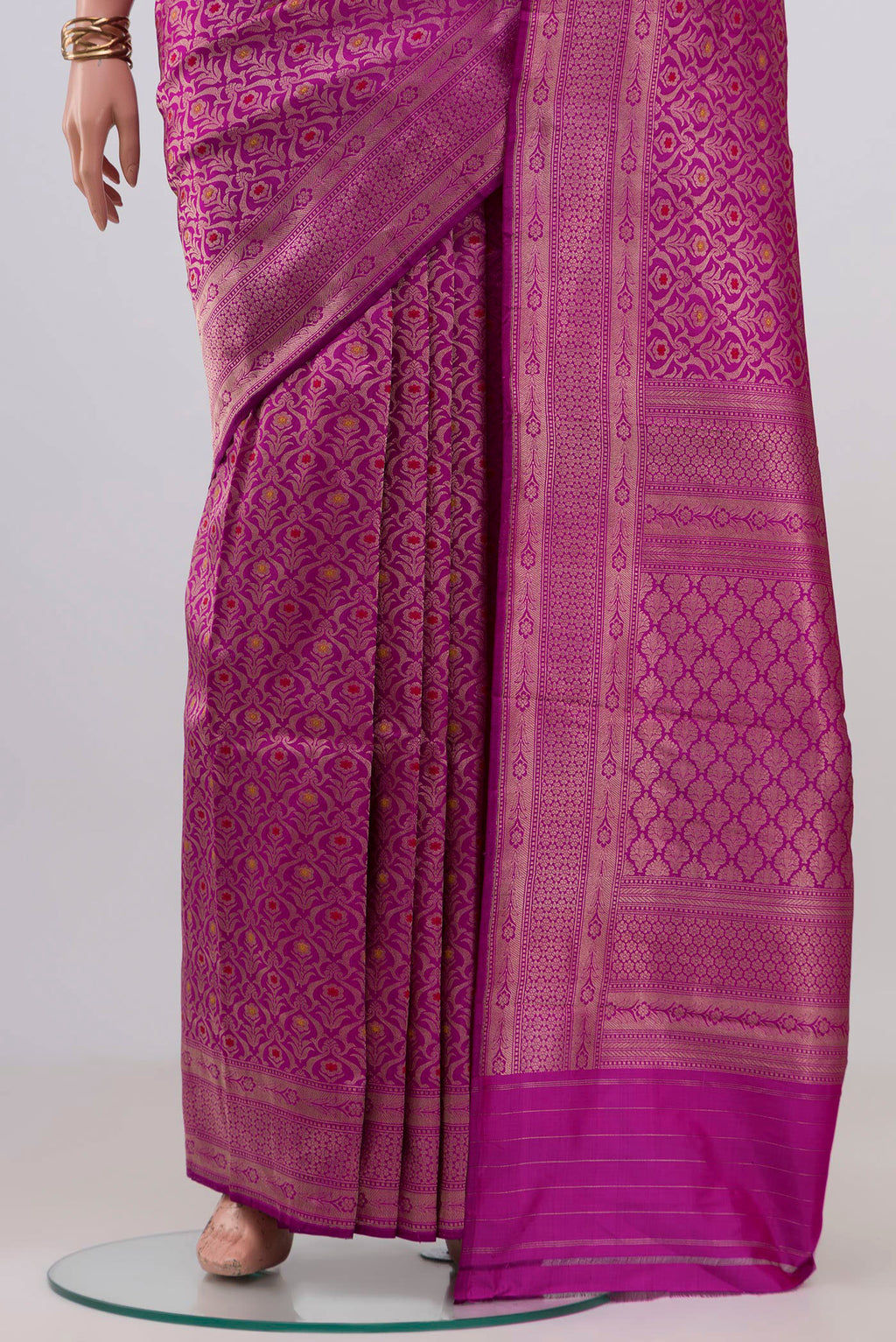 Pleats and pallu of Purple Banarasi Katan Silk Saree with Zari Brocade on the body and Zari Border. 