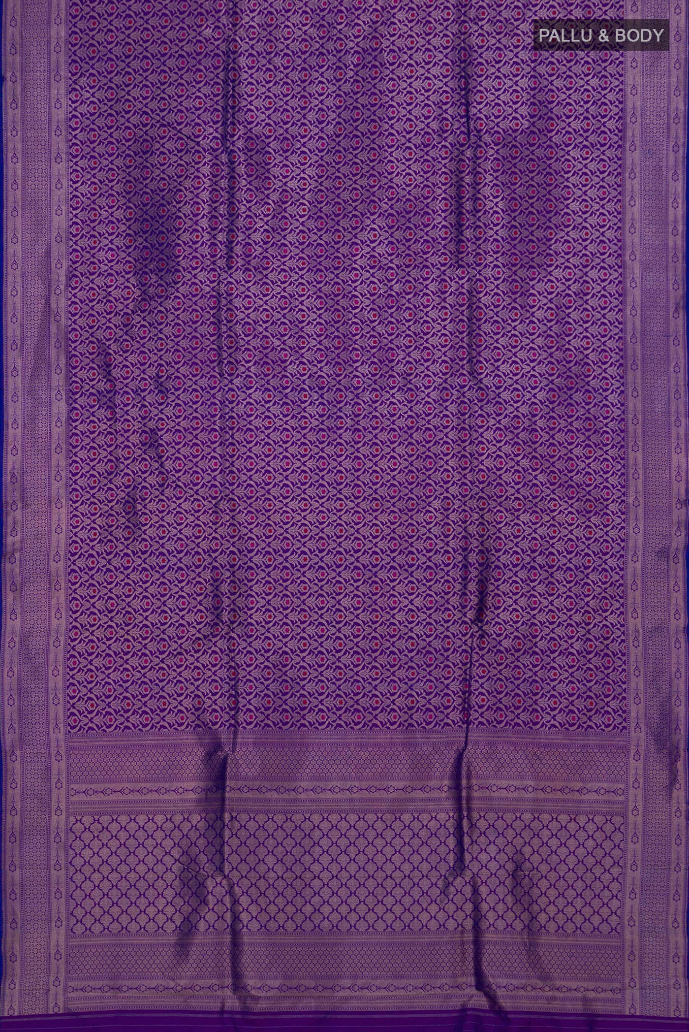 Flat view of Purple Banarasi Katan Silk Saree with Zari Brocade on the body and Zari Border. 