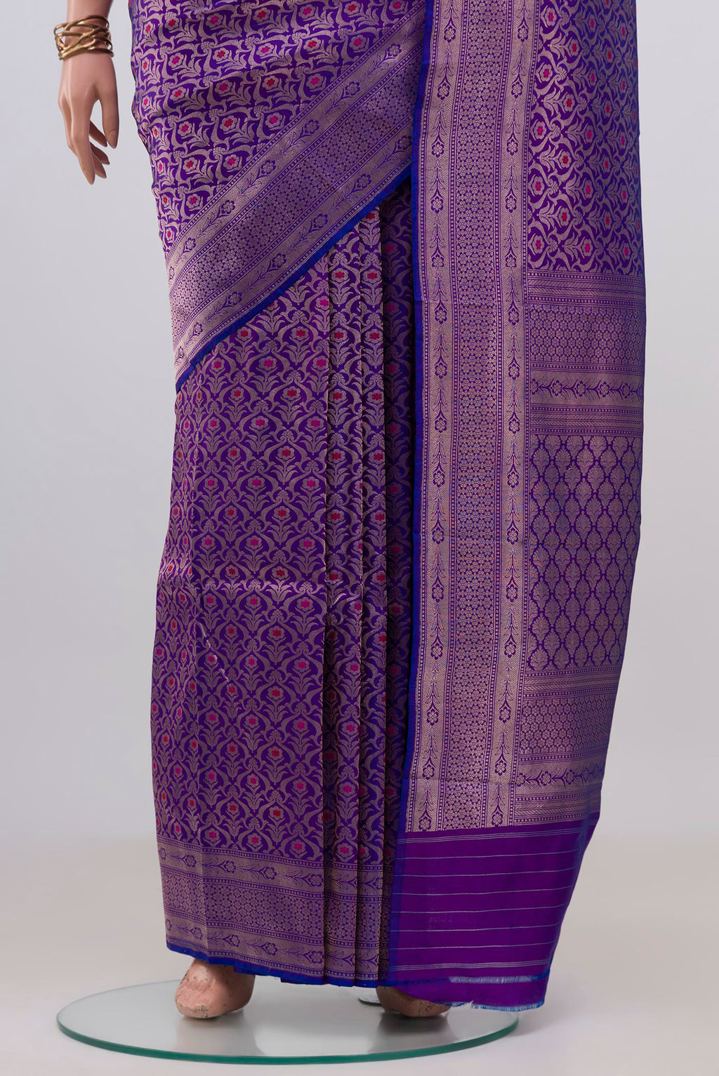Pleats and pallu of Purple Banarasi Katan Silk Saree with Zari Brocade on the body and Zari Border. 