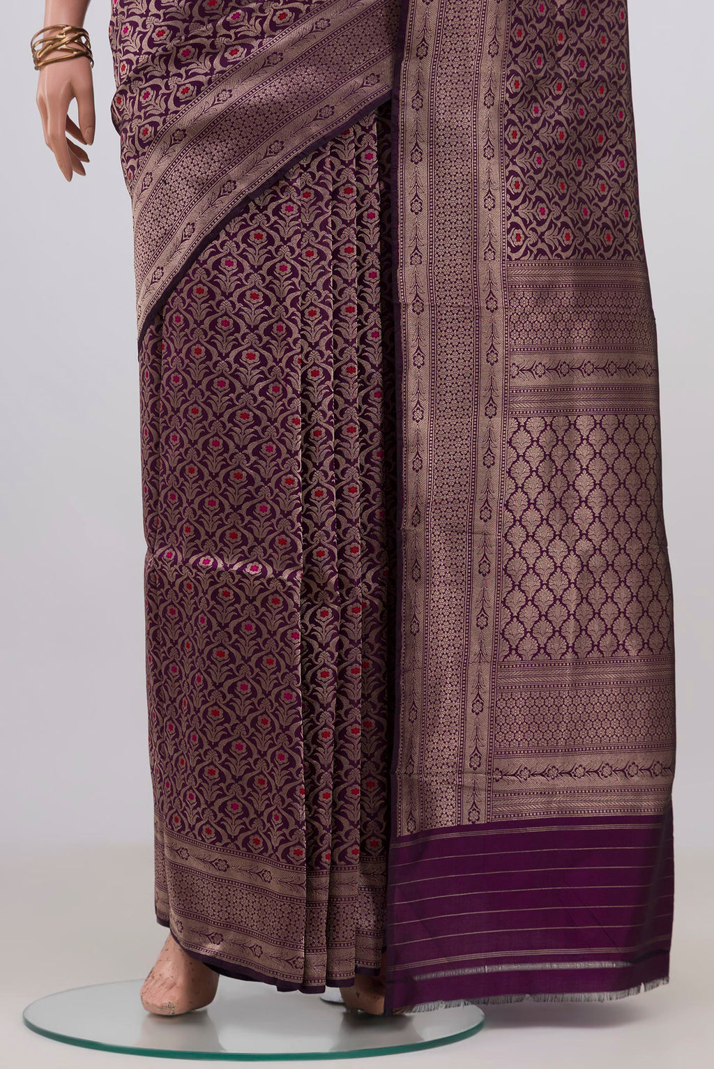 Pleats and pallu of Purple Banarasi Silk Saree with Zari Brocade on the body and Zari Border. 