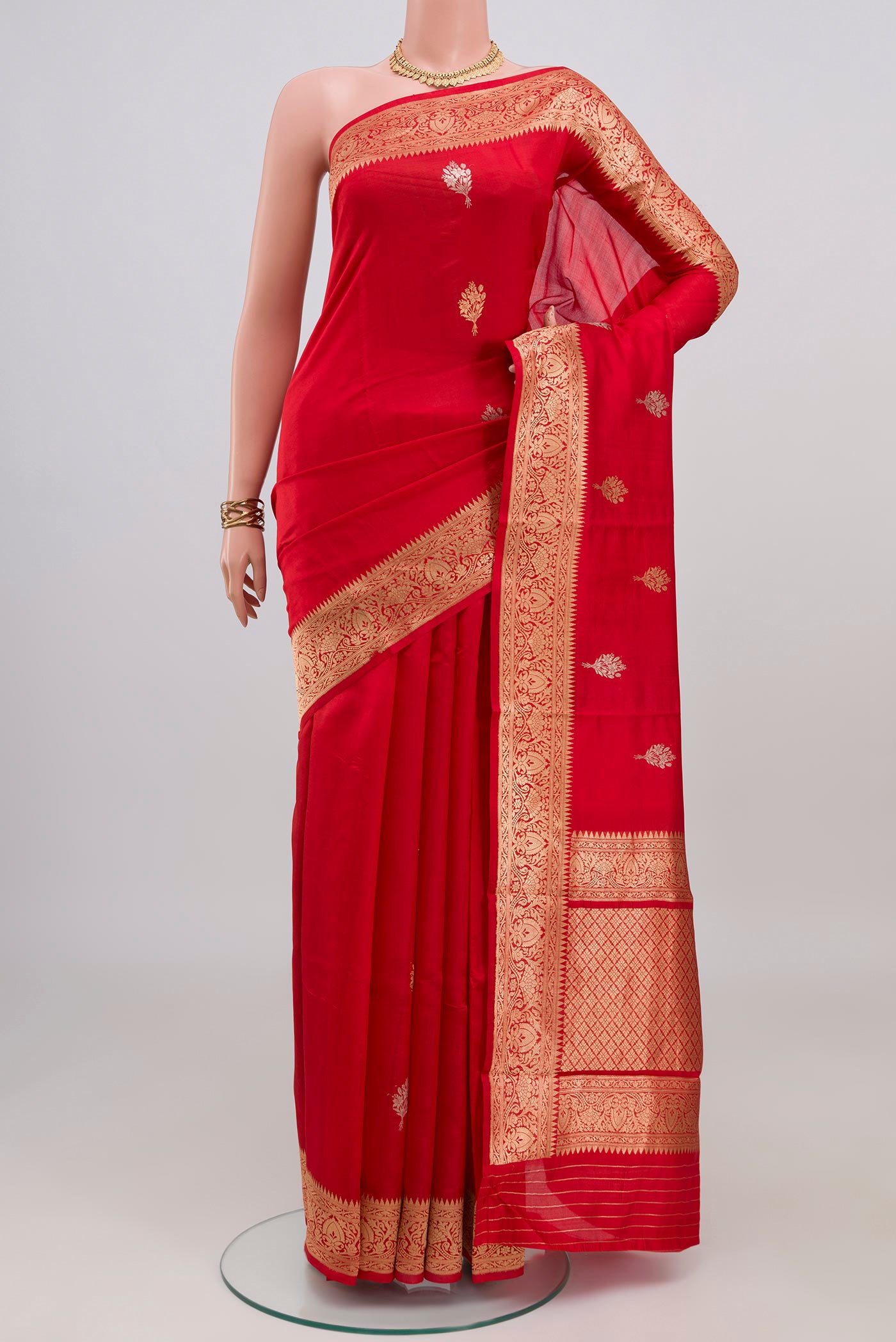 Red Banarasi Katan Silk Saree with Zari Butta on the body and Zari Border.  displayed on a mannequin