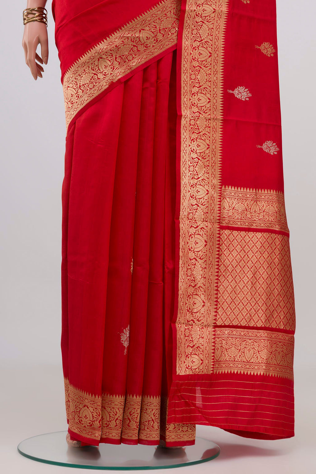 Pleats and pallu of Red Banarasi Katan Silk Saree with Zari Butta on the body and Zari Border. 