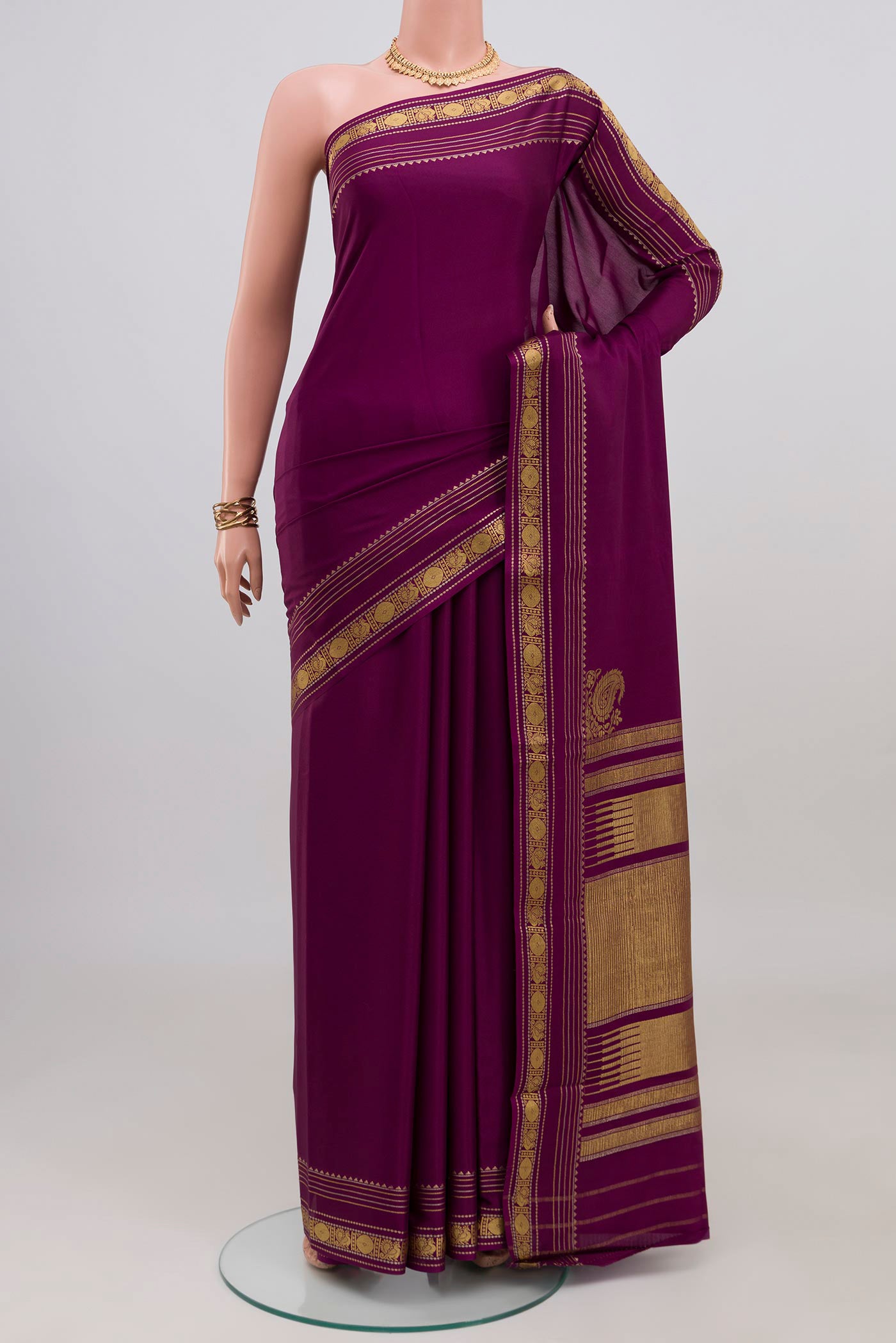 Purple Mysore Crepe Saree with Plain Body and Zari Border.  displayed on a mannequin