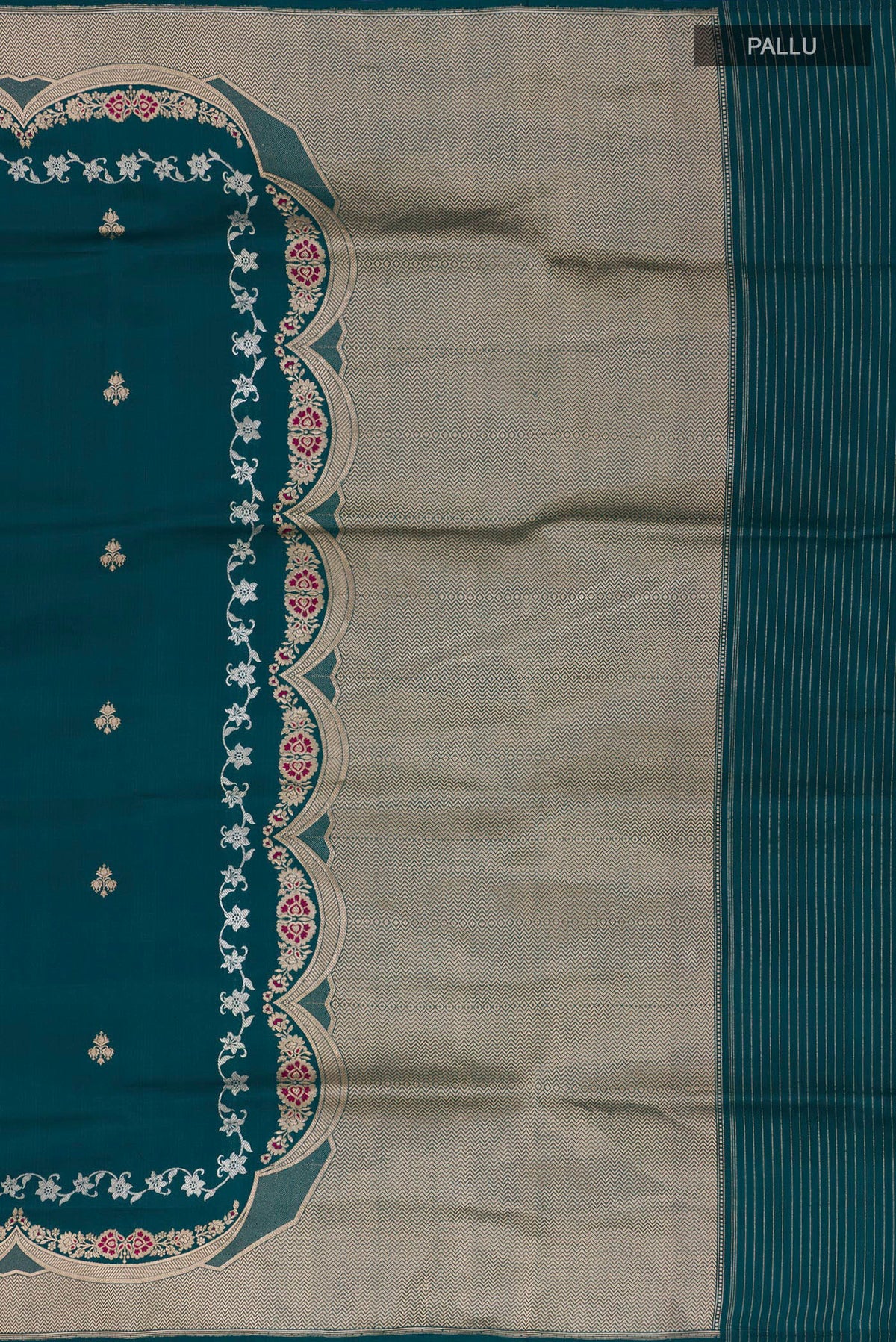 Close up image of the pallu of Pure Silk Teal Banarasi Saree with Zari Butta on the body and Fancy Border. 