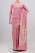 Rose pink Banarasi Silk Saree with Zari Butta on the body and Zari Border.  displayed on a mannequin