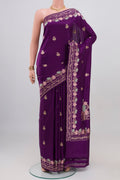 Purple Banarasi Silk Saree with Zari Butta on the body and Fancy Border.  displayed on a mannequin