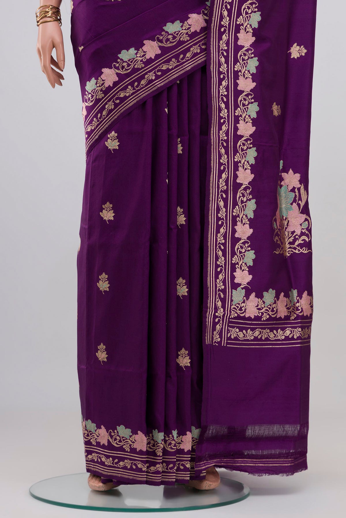 Pleats and pallu of Purple Banarasi Silk Saree with Zari Butta on the body and Fancy Border. 
