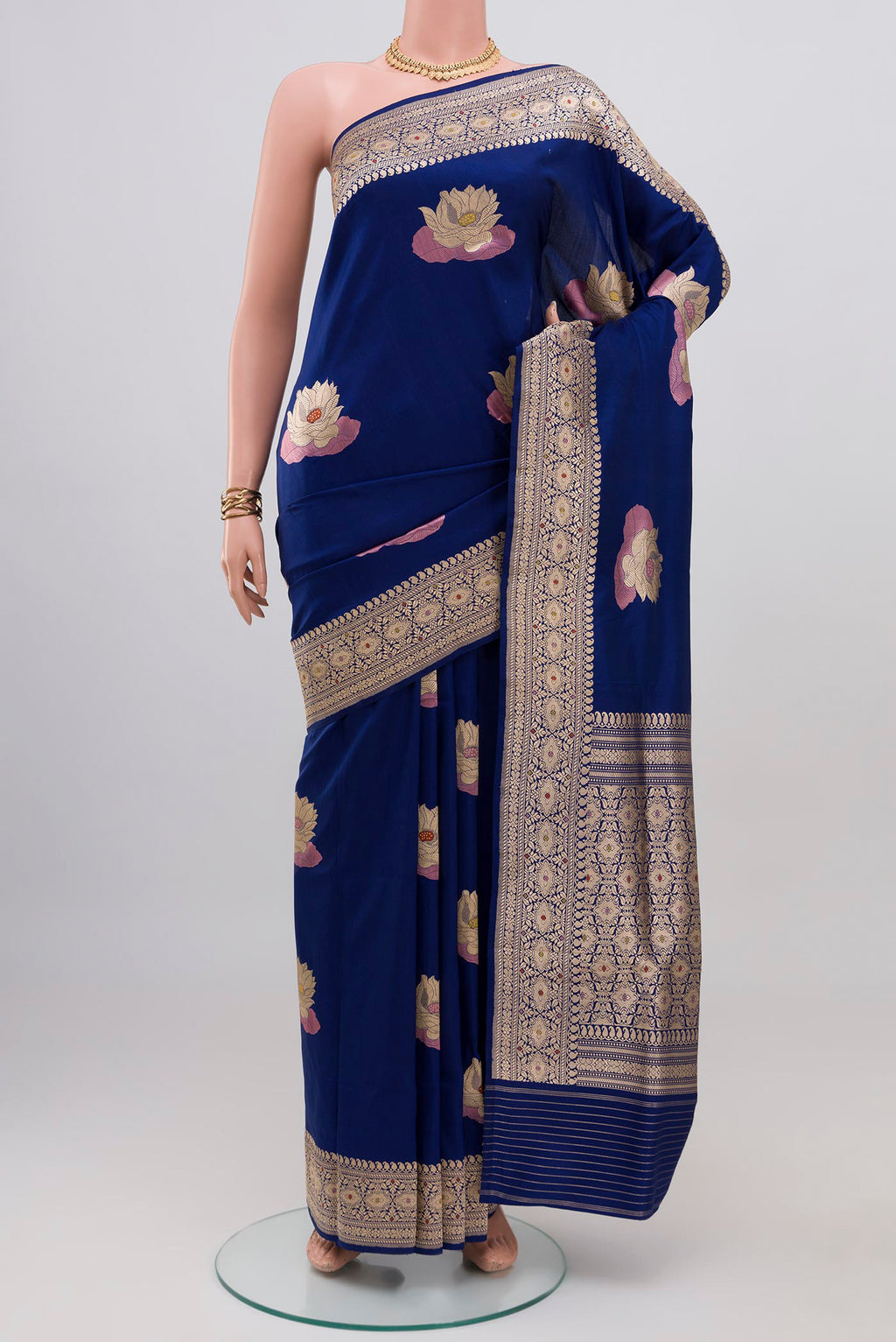 Blue Banarasi Silk Saree with Zari Butta on the body and Zari Border.  displayed on a mannequin