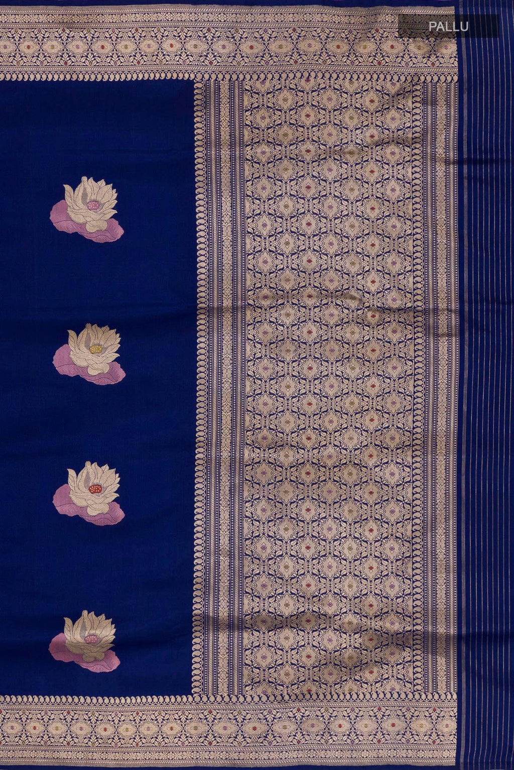 Close up image of the pallu of Blue Banarasi Silk Saree with Zari Butta on the body and Zari Border. 
