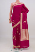 Dark Pink Banarasi Silk Saree with Zari Butta on the body and Zari Border.  displayed on a mannequin