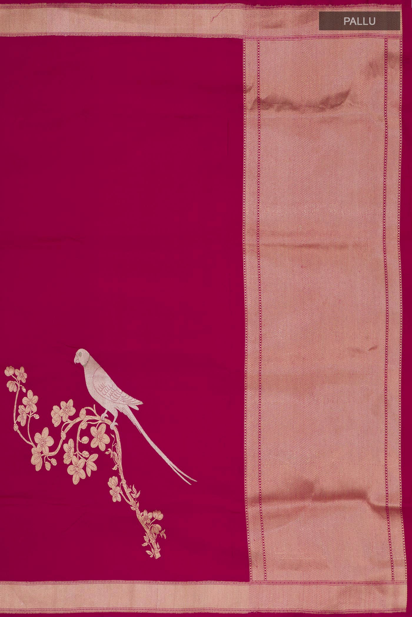Close up image of the pallu of Dark Pink Banarasi Silk Saree with Zari Butta on the body and Zari Border. 