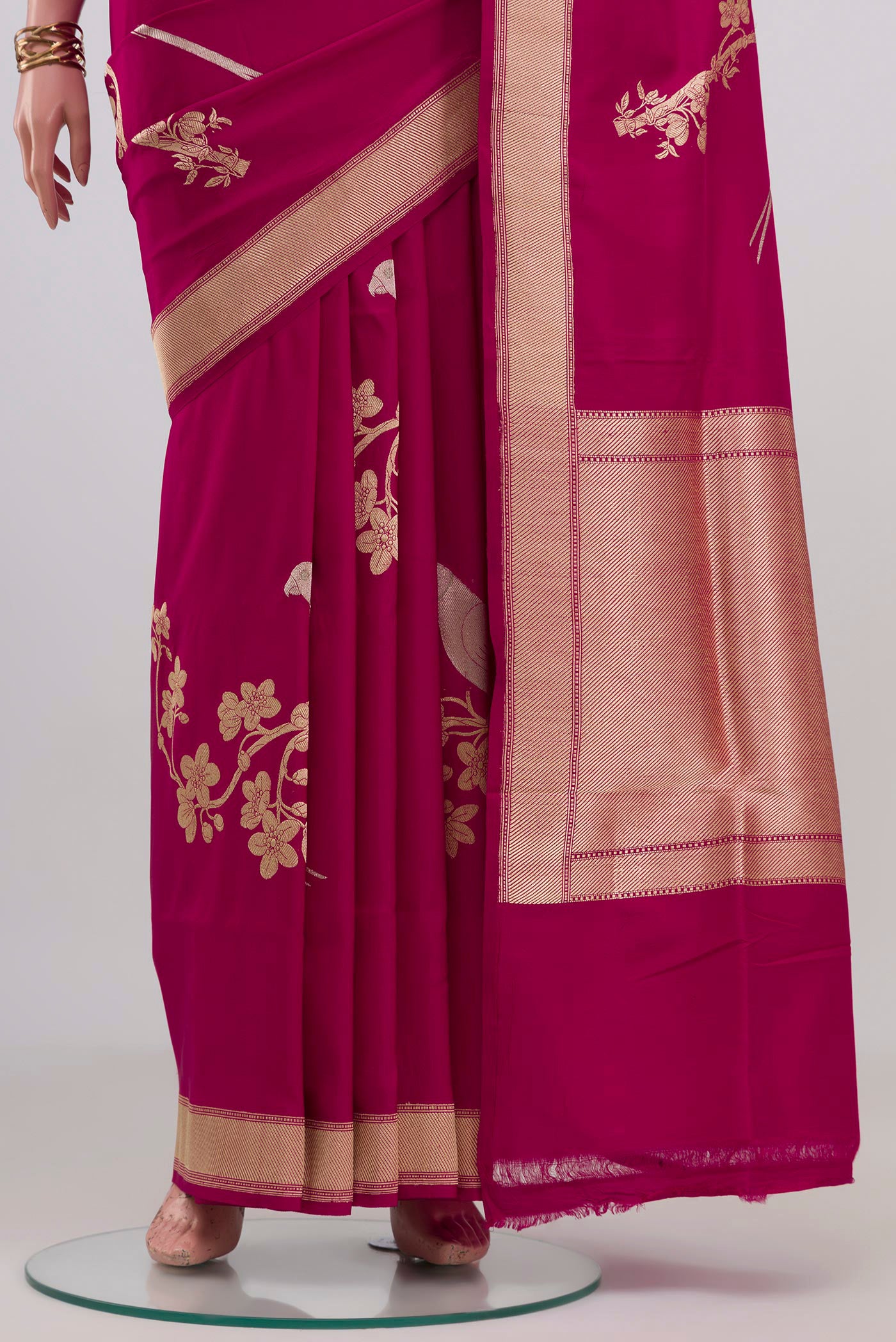 Pleats and pallu of Dark Pink Banarasi Silk Saree with Zari Butta on the body and Zari Border. 