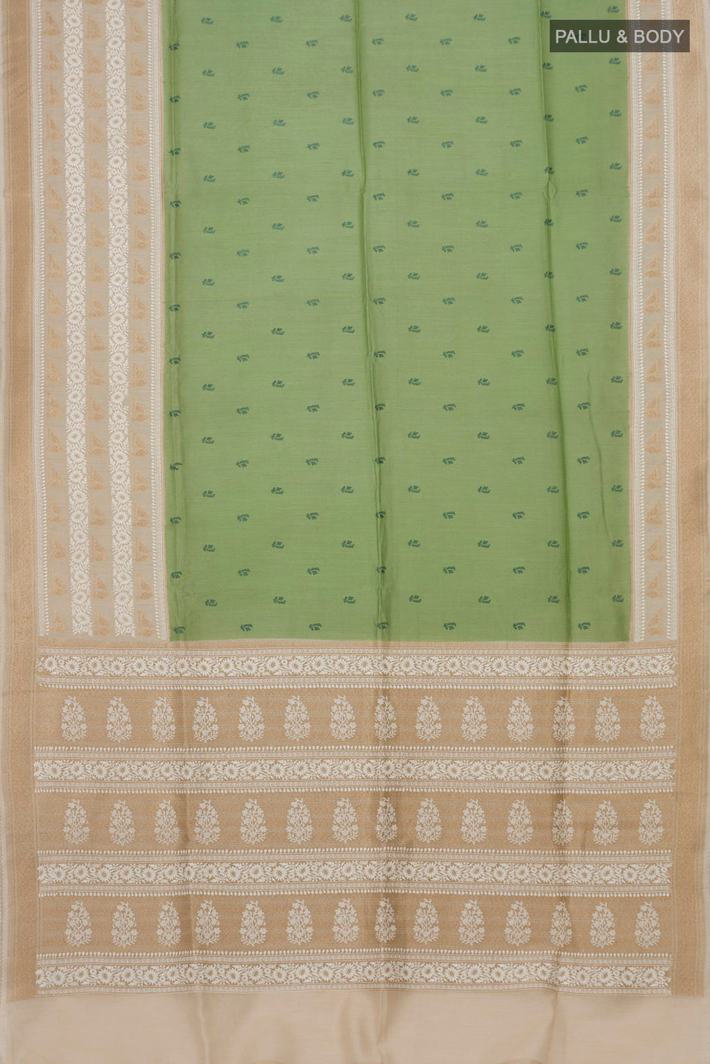 Flat view of Pista Green Tussar Silk Saree with Embroidery on the body and Zari And Thread Border. 