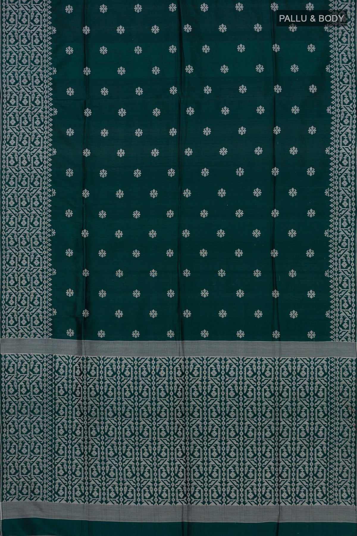 Flat view of Teal Tussar Saree with Thread Butta on the body and Fancy Border. 