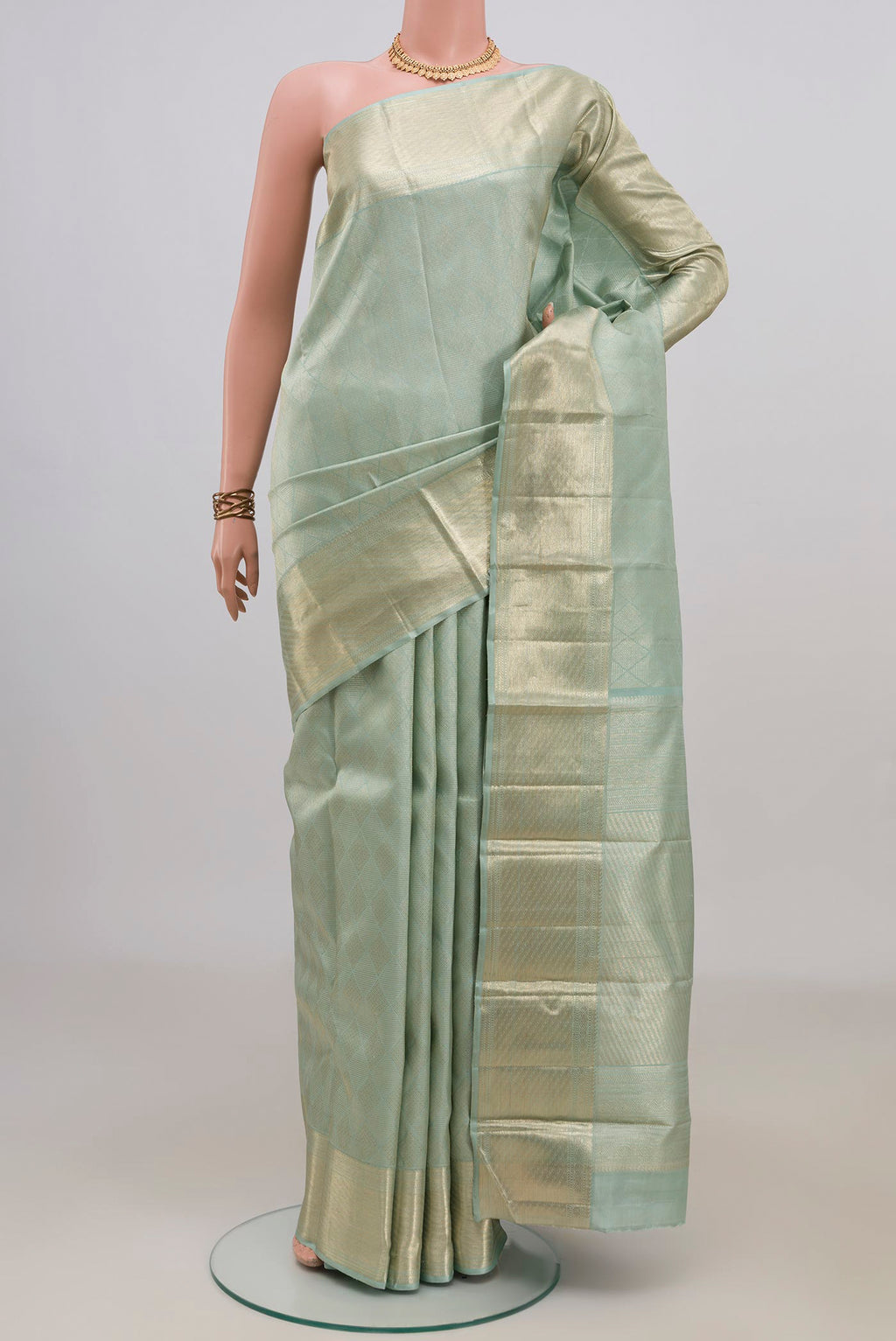 Pure Silk Light Blue Kanchipuram Saree with Zari Brocade on the body and Zari Border.  displayed on a mannequin