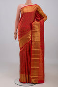 Red Kanchipuram Silk Saree with Zari Brocade on the body and Zari Border.  displayed on a mannequin
