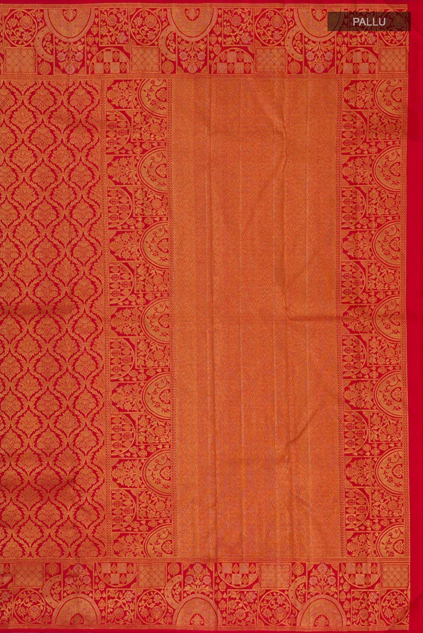 Close up image of the pallu of Red Kanjivaram Silk Saree with Zari Brocade on the body and Fancy Border. 