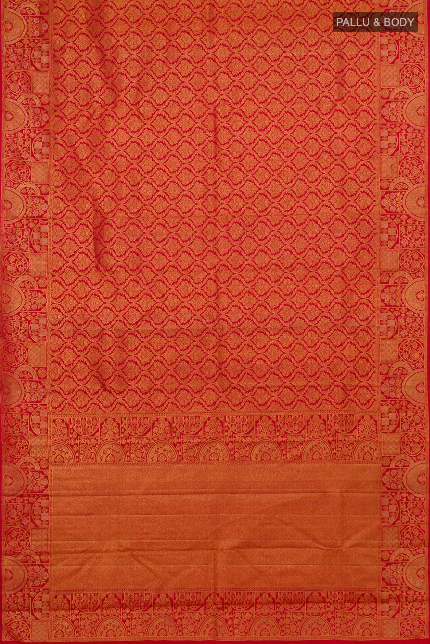 Flat view of Red Kanjivaram Silk Saree with Zari Brocade on the body and Fancy Border. 