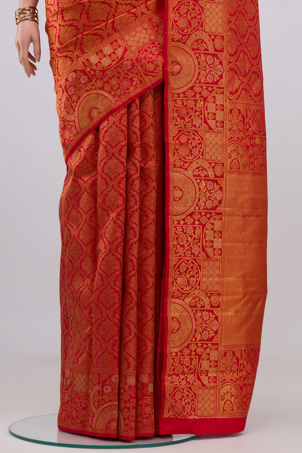 Pleats and pallu of Red Kanjivaram Silk Saree with Zari Brocade on the body and Fancy Border. 