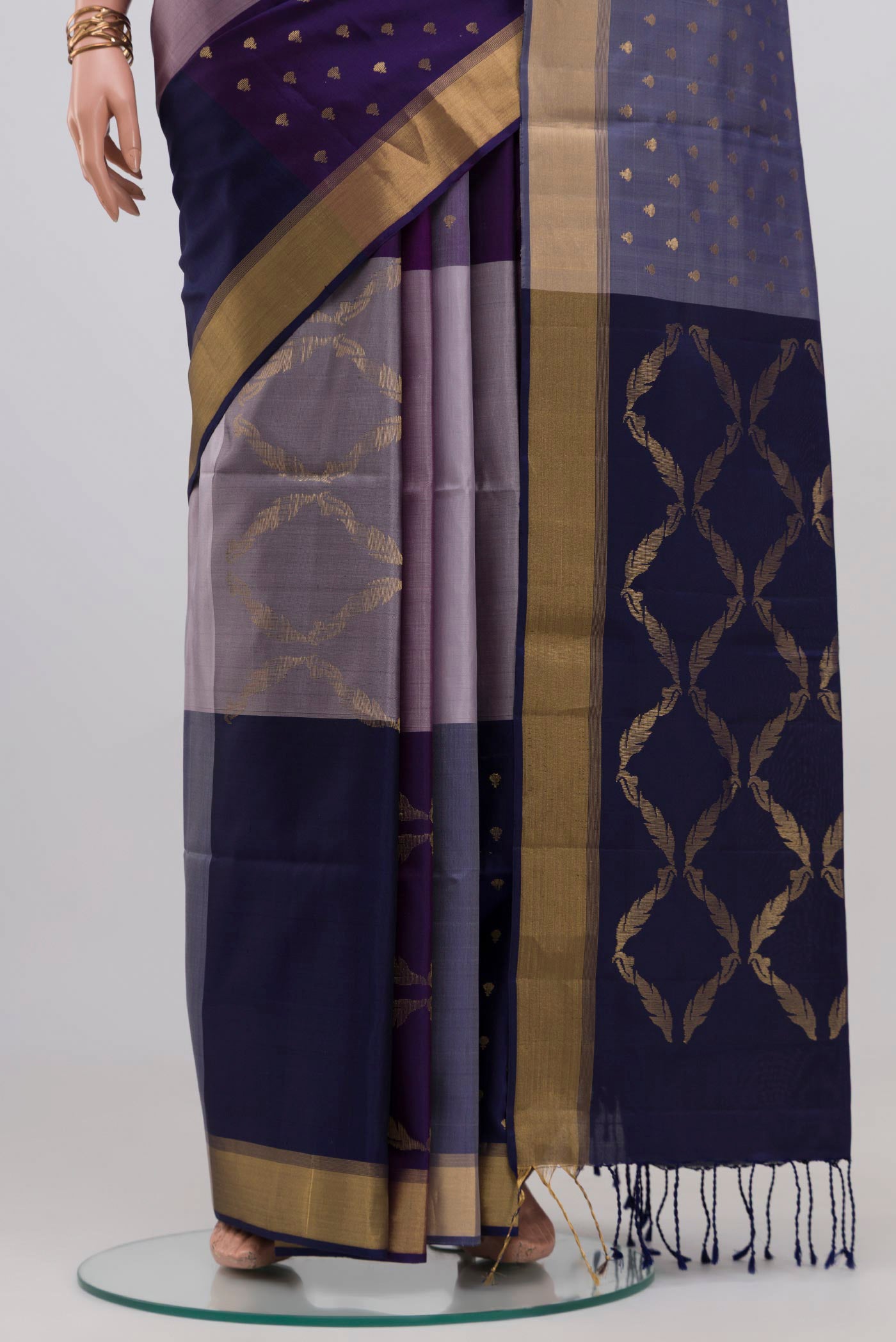 Pleats and pallu of Multi Color Soft Silk Saree with Zari Butta on the body and Zari Border. 
