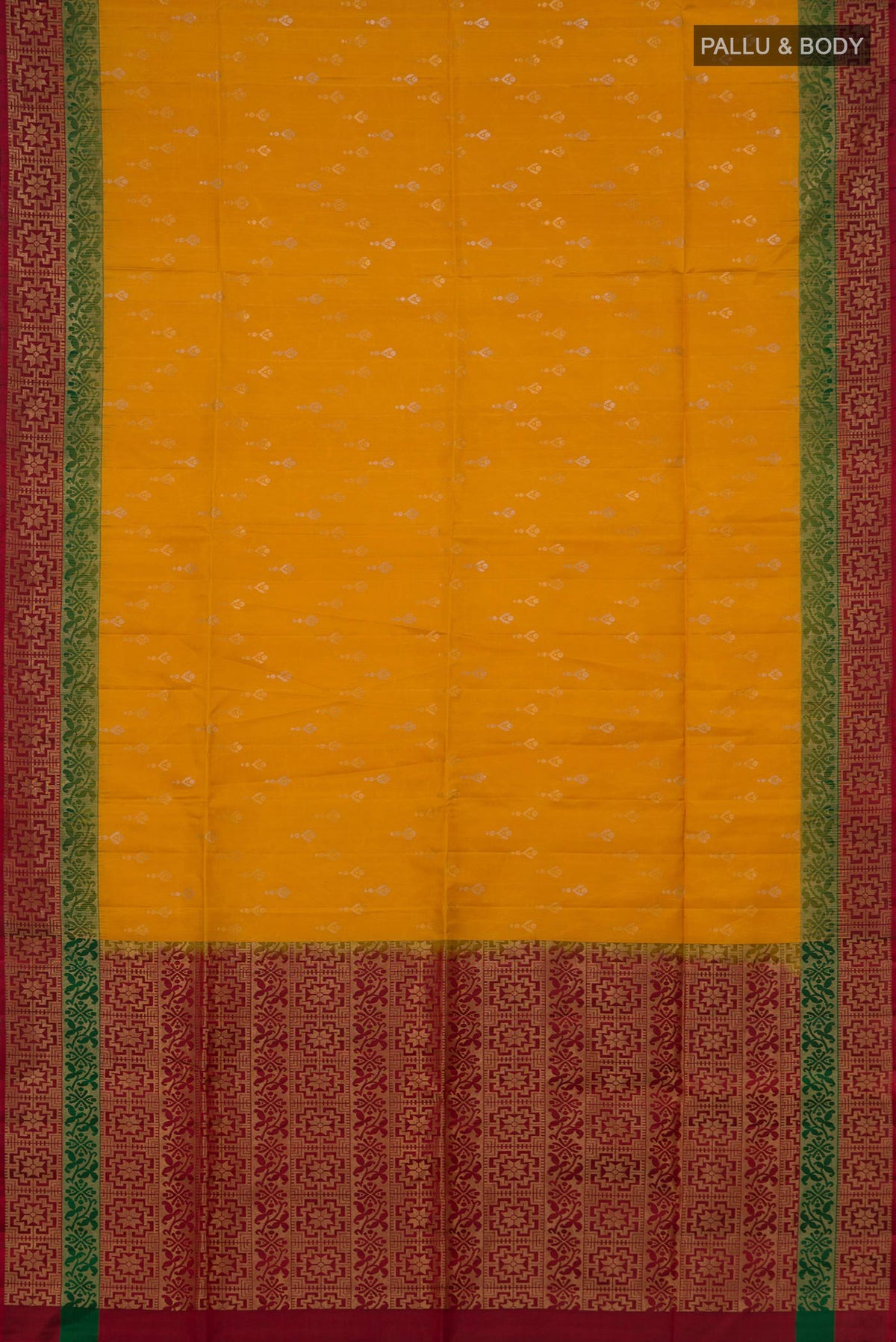 Flat view of Pure Silk Mustard Soft Saree with Zari Butta on the body and Zari Border. 