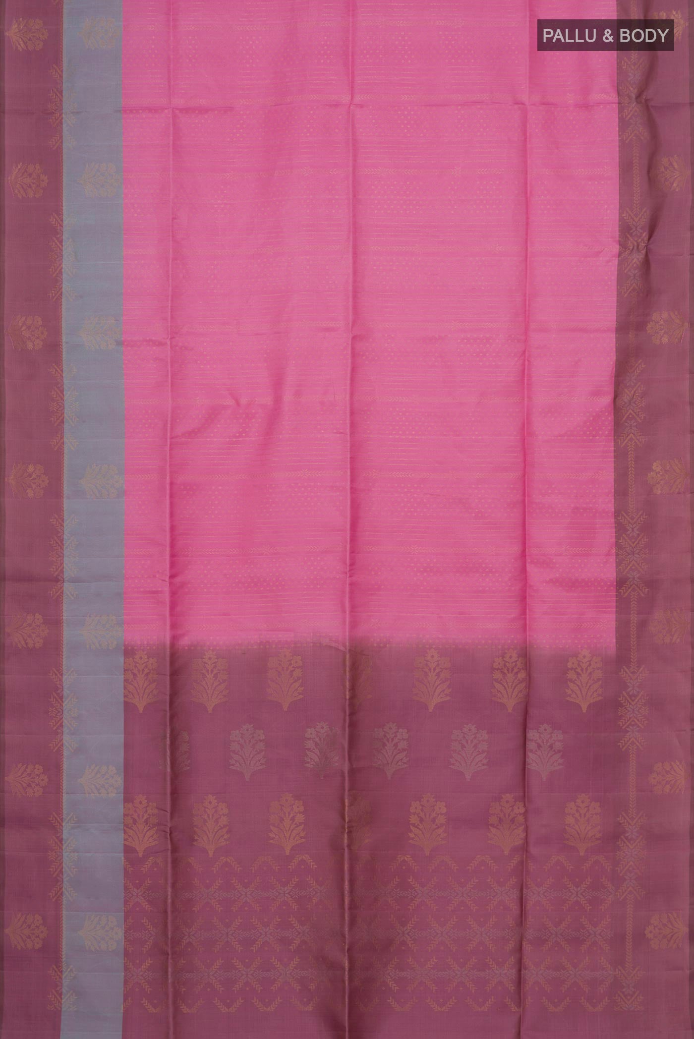 Flat view of Rose pink Soft Silk Saree with Zari Butta on the body and Fancy Border. 