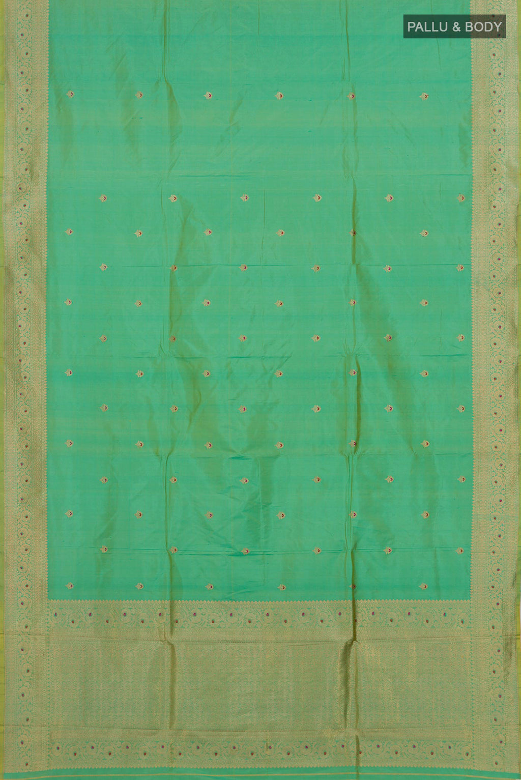 Flat view of Pure Silk Green Banarasi Katan Saree with Zari Butta on the body and Zari Border. 