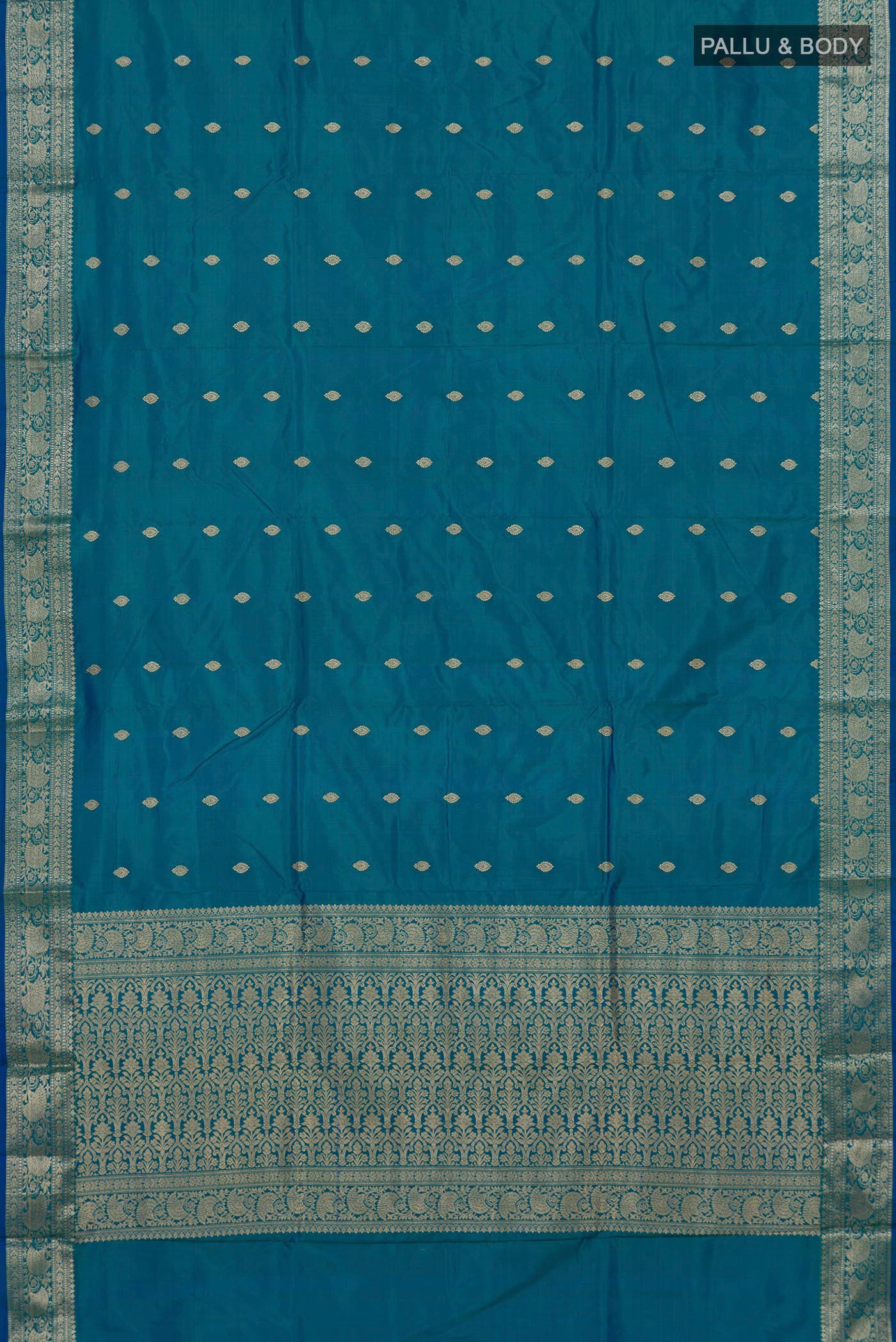 Flat view of Blue Banarasi Katan Silk Saree with Zari Butta on the body and Zari Border. 