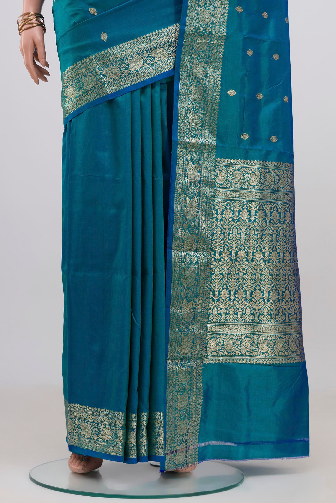 Pleats and pallu of Blue Banarasi Katan Silk Saree with Zari Butta on the body and Zari Border. 