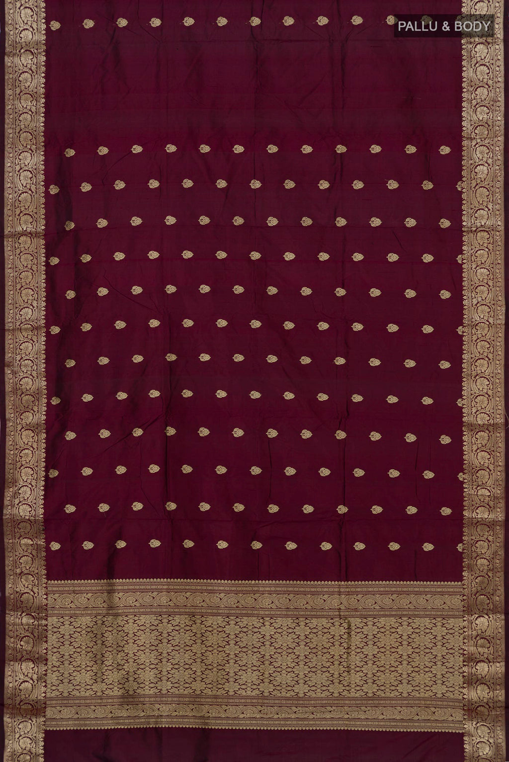 Flat view of Maroon Banarasi Katan Silk Saree with Zari Butta on the body and Zari Border. 