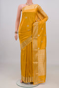 Pure Silk Yellow Banarasi Katan Saree with Zari Butta on the body and Zari Border.  displayed on a mannequin