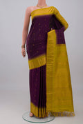 Purple Gadwal Silk Saree with Zari Butta on the body and Zari Border.  displayed on a mannequin