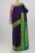 Dark Blue Gadwal Silk Saree with Checked design on the body and Zari Border.  displayed on a mannequin