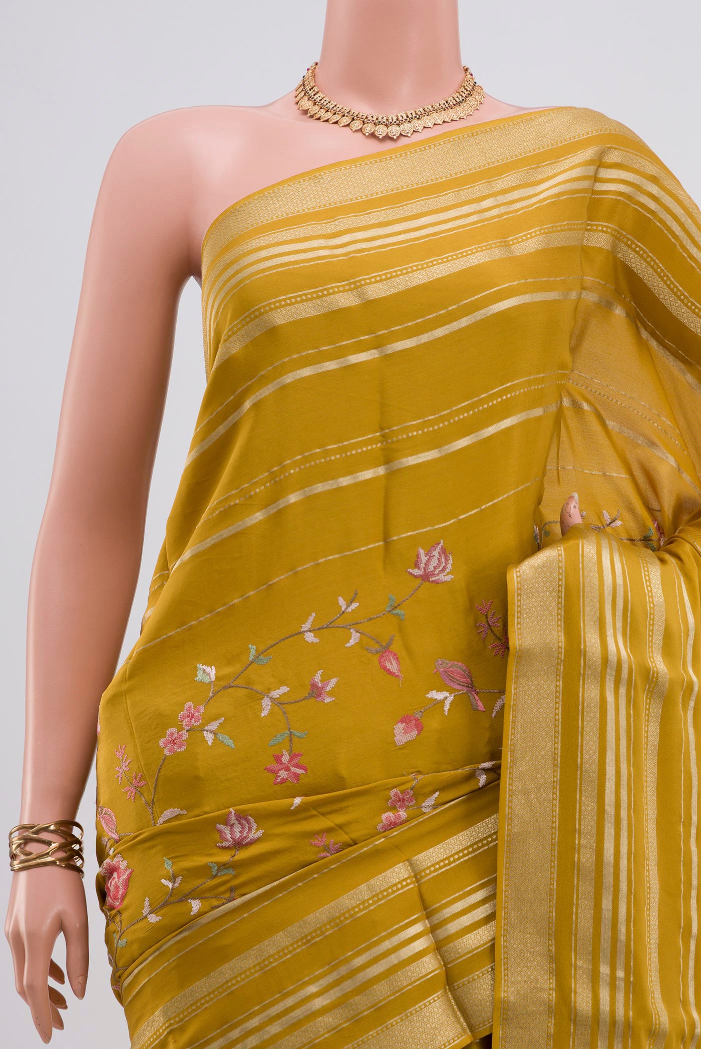 Border image of Yellow Crepe Saree with Fancy on the body and Fancy Border. 