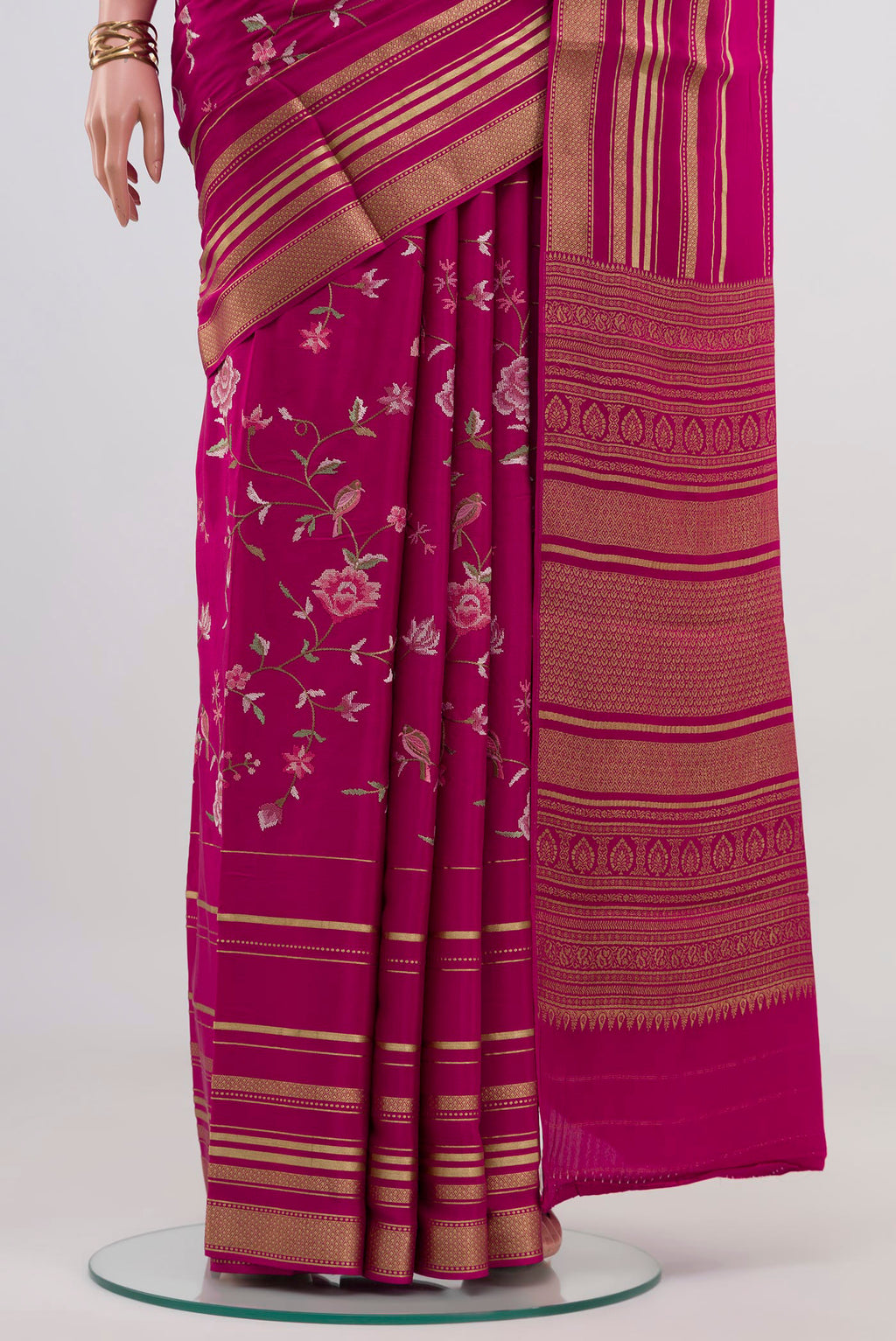 Pleats and pallu of Pink Crepe Saree with Fancy on the body and Fancy Border. 