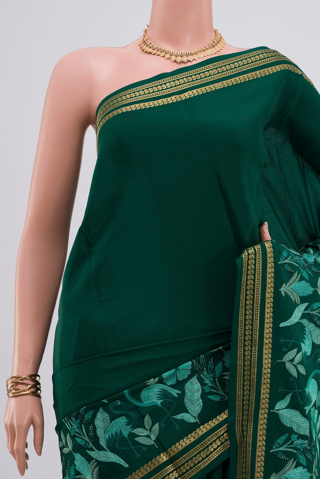 Border image of Green Crepe Saree with Fancy on the body and Fancy Border. 