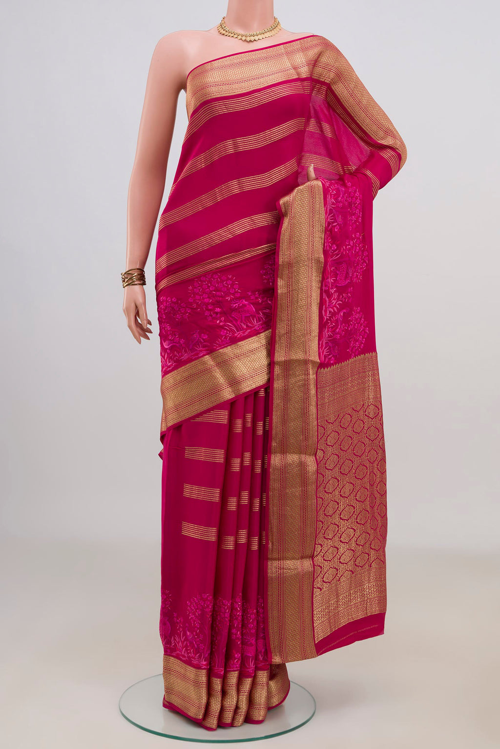 Pink Mysore Crepe Saree with Stripes on the body and Zari Border.  displayed on a mannequin