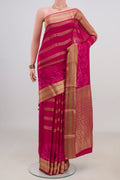 Pink Mysore Crepe Saree with Stripes on the body and Zari Border.  displayed on a mannequin