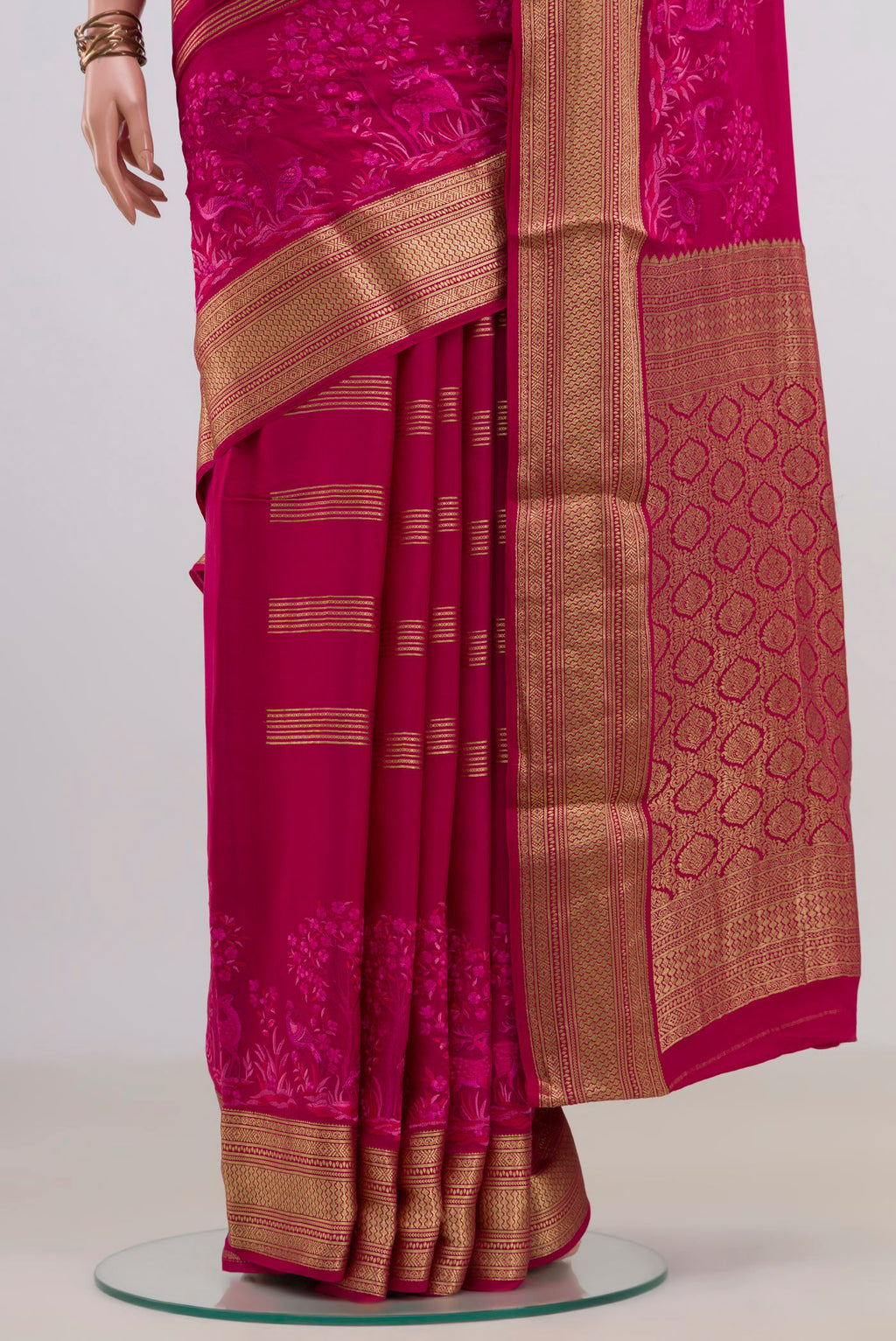 Pleats and pallu of Pink Mysore Crepe Saree with Stripes on the body and Zari Border. 