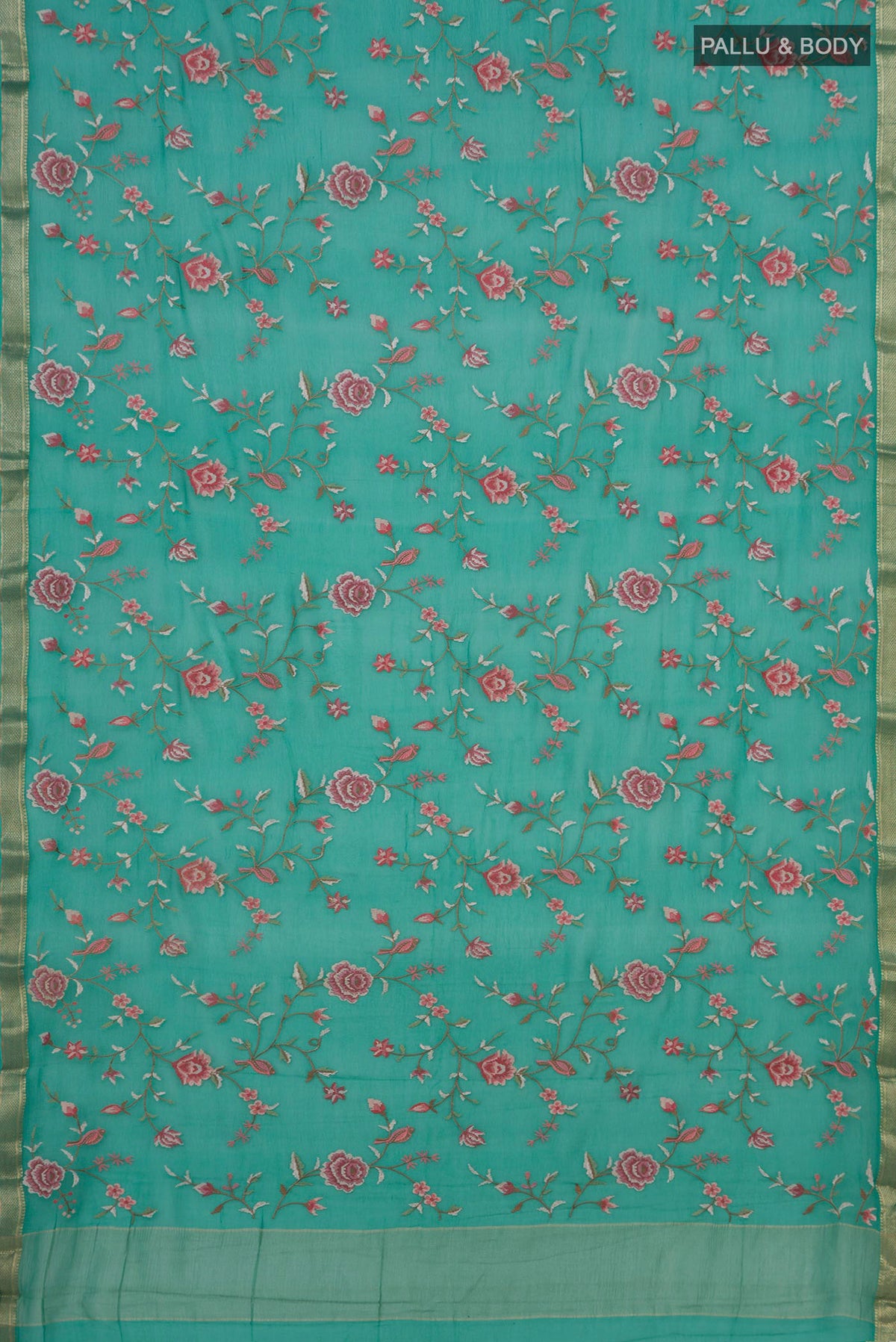 Flat view of Sea Green Mysore Chiffon Saree with Embroidery on the body and Zari Border. 