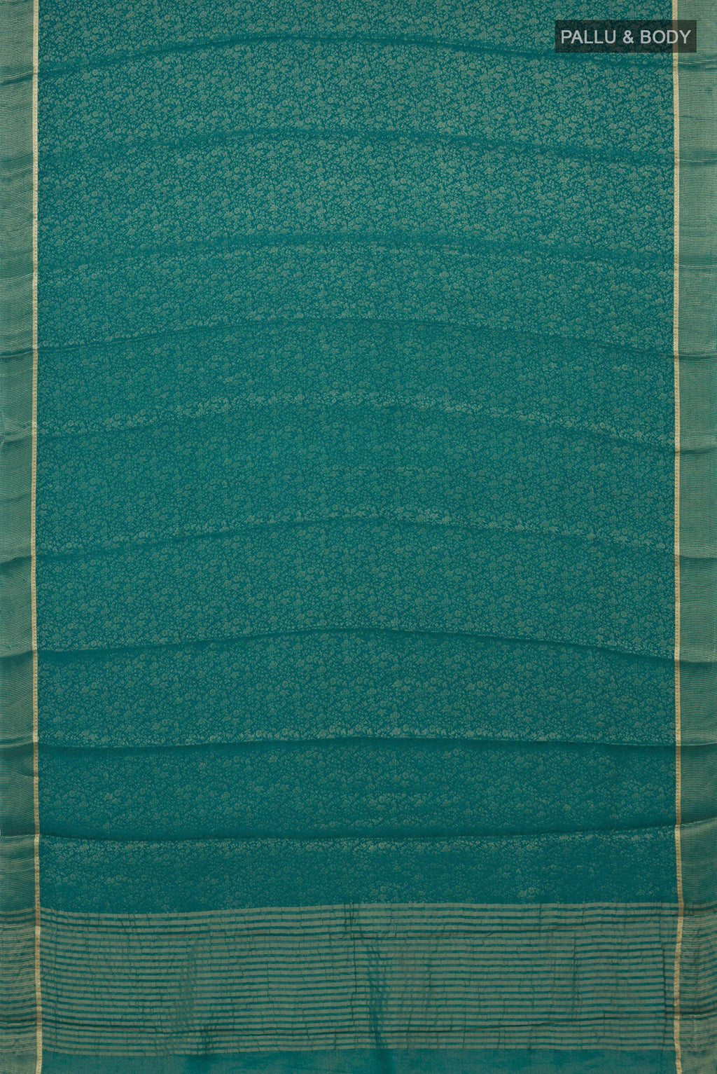 Flat view of Sea Green Mysore Crepe Saree with Zari Brocade on the body and Thin Zari Line. 