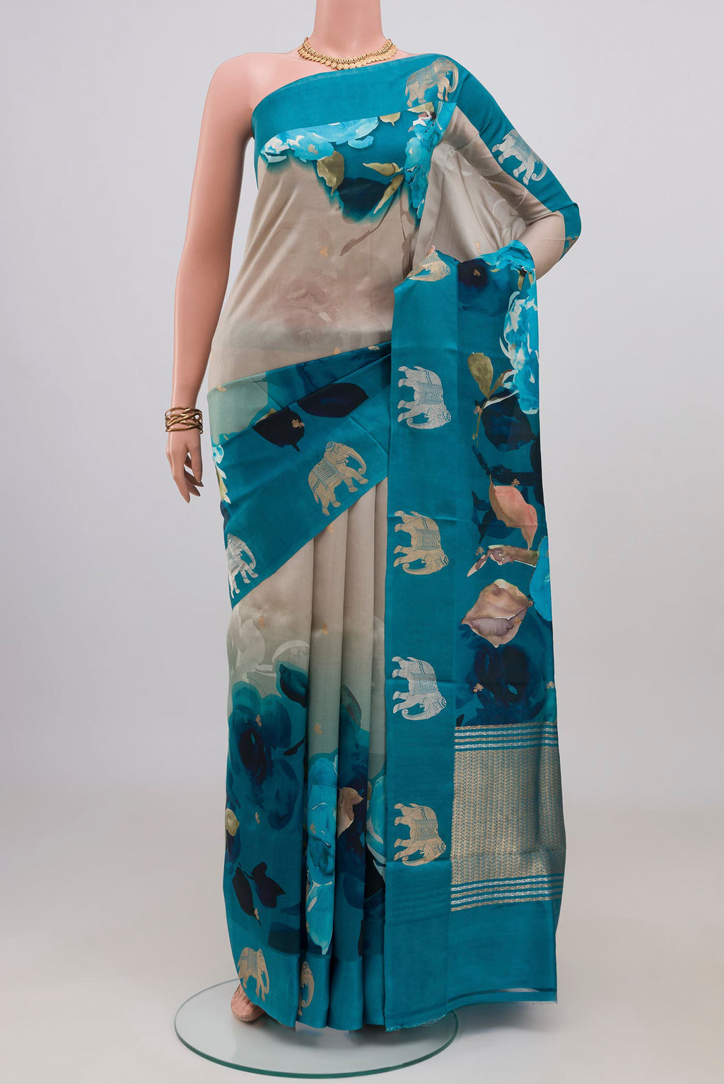 Beige Banarasi Katan Silk Saree with Floral Print on the body and Fancy Border.  displayed on a mannequin
