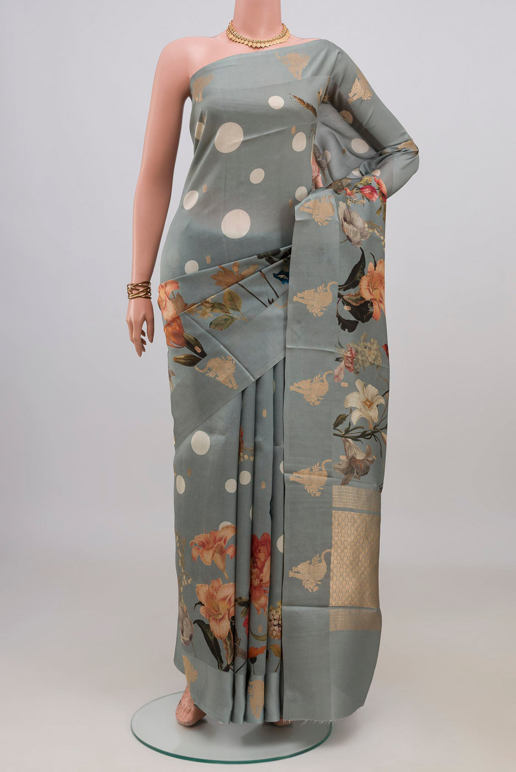 Grey Banarasi Katan Silk Saree with Polka Dots on the body and Fancy Border.  displayed on a mannequin