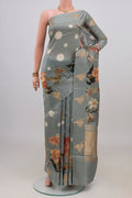 Grey Banarasi Katan Silk Saree with Polka Dots on the body and Fancy Border.  displayed on a mannequin