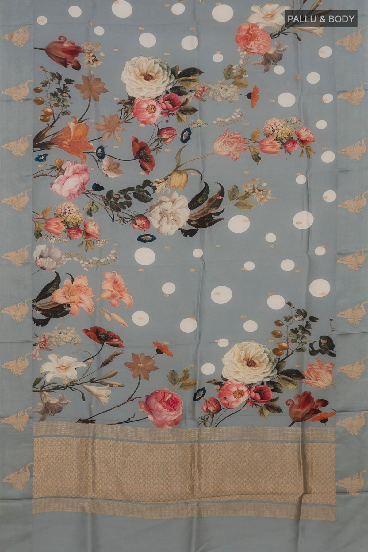 Flat view of Grey Banarasi Katan Silk Saree with Polka Dots on the body and Fancy Border. 
