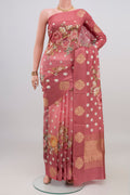 Pink Tussar Silk Saree with Printed design on the body and Fancy Border.  displayed on a mannequin