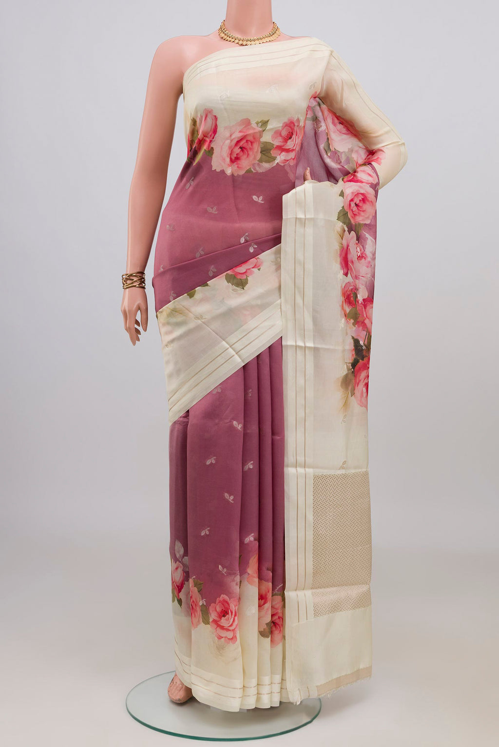 Pink Banarasi Katan Silk Saree with Floral Print on the body and Thin Zari Line.  displayed on a mannequin